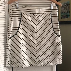 Black and white striped skirt.